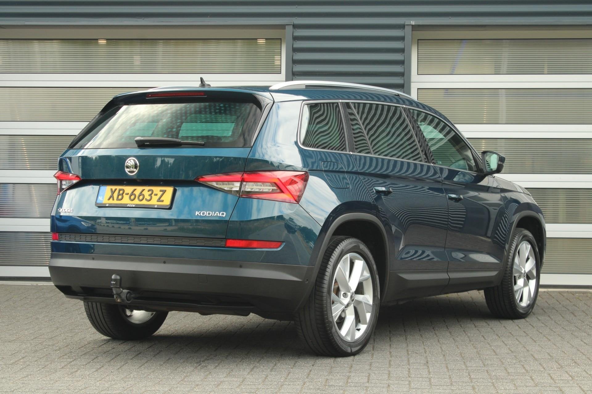 Skoda Kodiaq 1.5 TSI 150pk DSG Style Business 7p. | Trekhaak, Auto's, 12 maanden, 1525 kg, 4 cilinders, Blauw