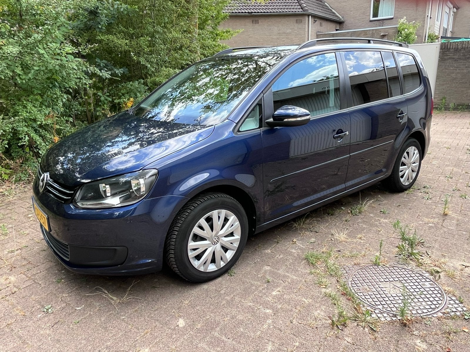 VW Touran Comfortline 1.2TSI (2013) - geen import - trekhaak, Blauw, Origineel Nederlands, 75 €/maand, Handgeschakeld