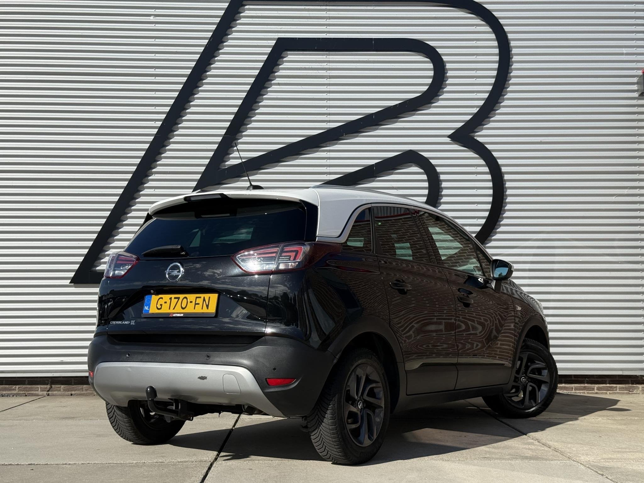 Opel Crossland X 1.2 Turbo 120 Jaar Edition 2e Eigenaar|Navi, Auto's, Gebruikt, Automatische klimaatregeling, Zwart, Origineel Nederlands