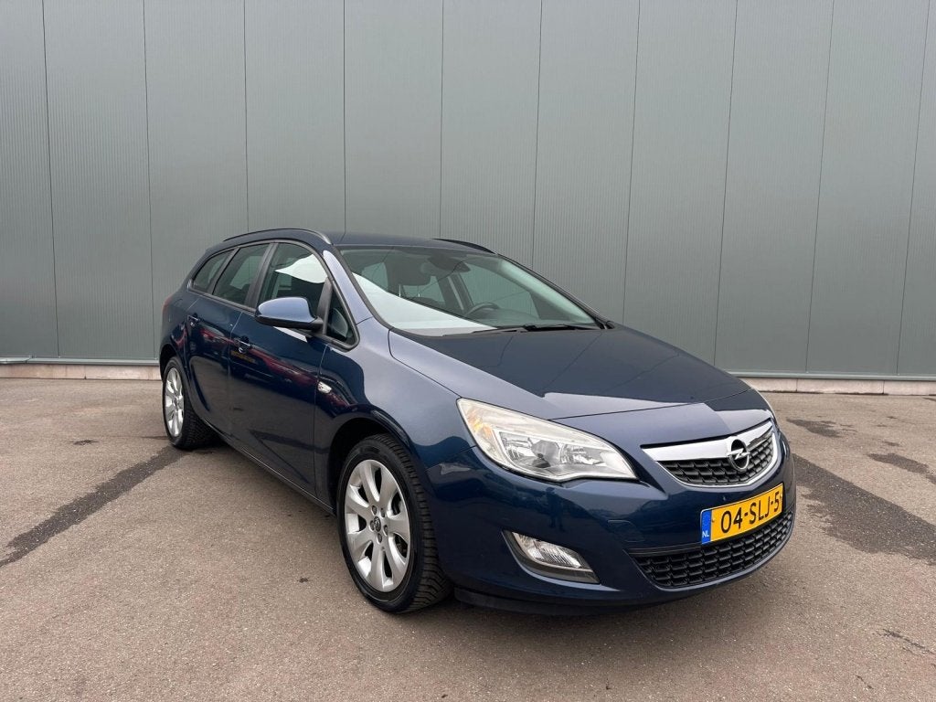 Opel Astra Sports Tourer 1.4 Turbo Edition ONDERHOUDSBOEKJE, Auto's, Euro 5, 15 km/l, 4 cilinders, Blauw