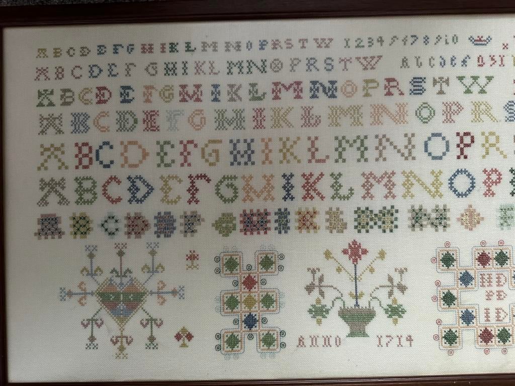 T.k ingelijste geborduurde merklap, Ophalen