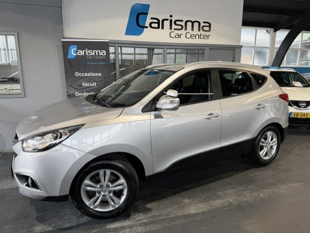 Hyundai Ix35 2.0i 4WD Active Aut.|Leder|Airco|NW APK, Auto's, Automaat, Gebruikt, Zwart, 4 cilinders