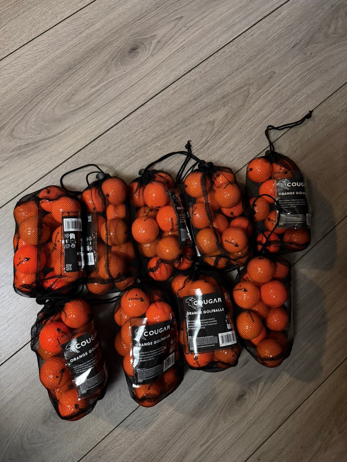 100 nieuwe oranje Cougar golfballen, Overige merken, Bal(len), Nieuw, 6603EB