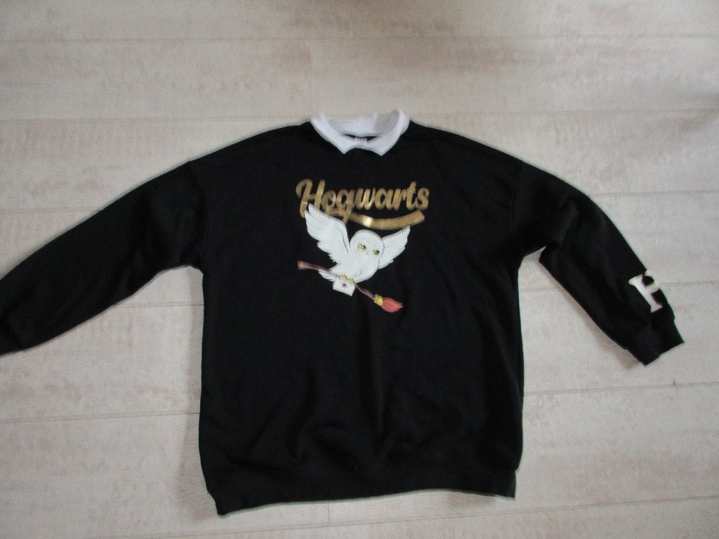 Mooi zwarte Harry Potter trui maat 170-176 - Als nieuw, Kinderen en Baby's, C&A, Meisje, Ophalen of Verzenden, Zo goed als nieuw