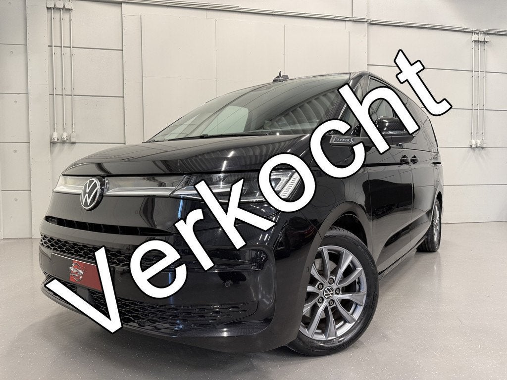 Volkswagen Multivan 1.4 eHybrid L2 Energetic 6p. PANO/TREKHA, Gebruikt, Zwart, Met garantie (alle), 7 stoelen