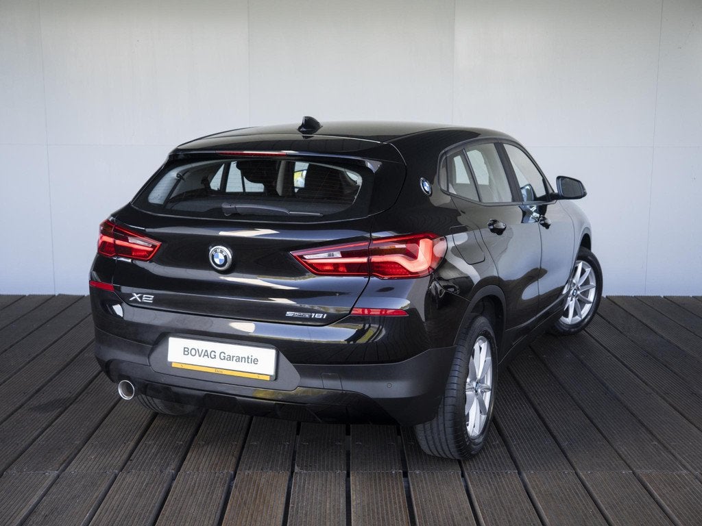 BMW X2 sDrive18i | Cruise Control | Stoelverwarming | PDC |, Auto's, BMW, 12 maanden, Gebruikt, Euro 6, Zwart