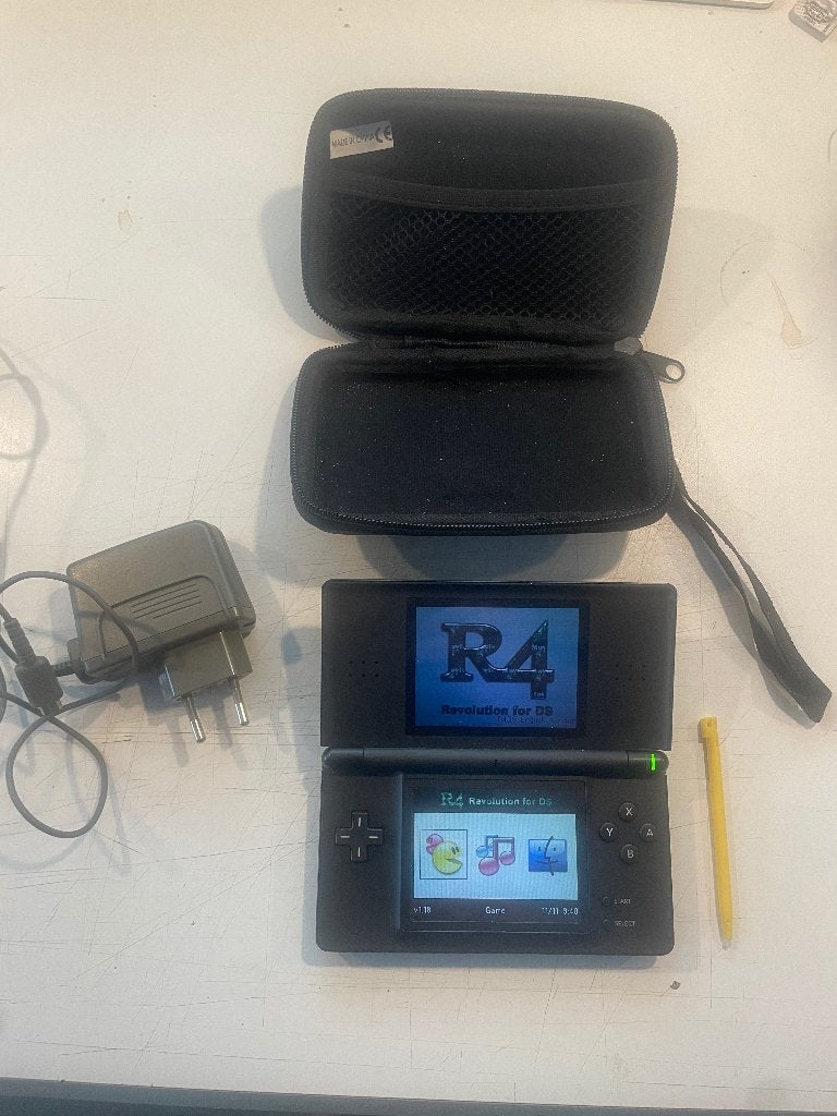 Nintendo DS Lite, Spelcomputers en Games, Spelcomputers | Nintendo DS, Met games, Gebruikt, Zwart, Ophalen of Verzenden