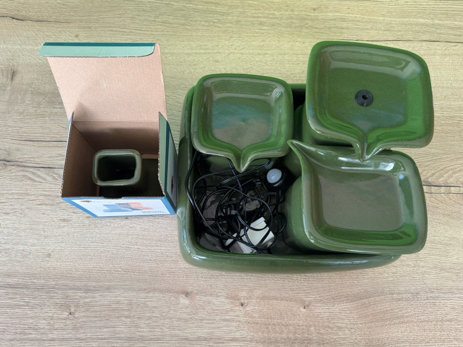 Katten drinkfontein, Ophalen