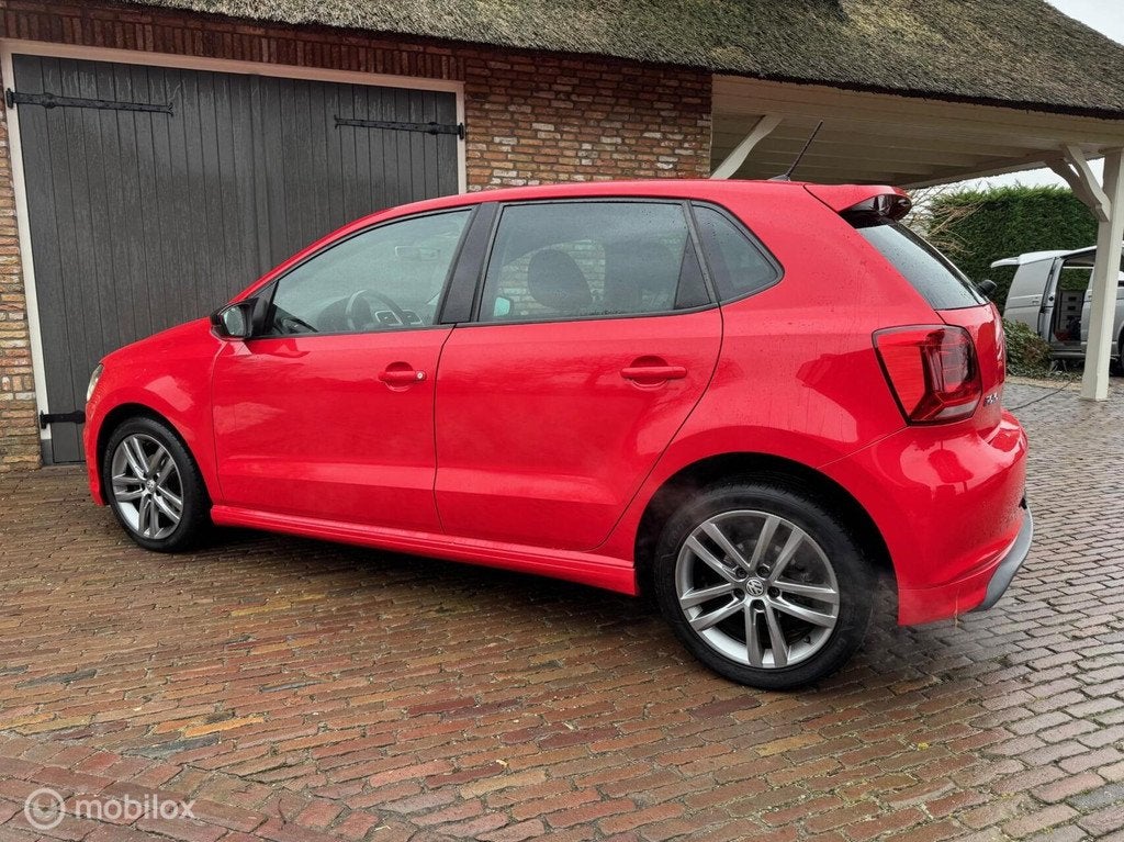Volkswagen Polo 1.2 TSI - 90 pk - 5 deurs - R line, Auto's, Volkswagen, Automatische klimaatregeling, Gebruikt, 4 cilinders, Bedrijf