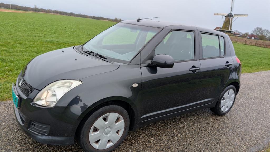 Suzuki Swift 1.3 5D 2008 Zwart, Auto's, Suzuki, Voorwielaandrijving, 40 €/maand, 400 kg, Bedrijf