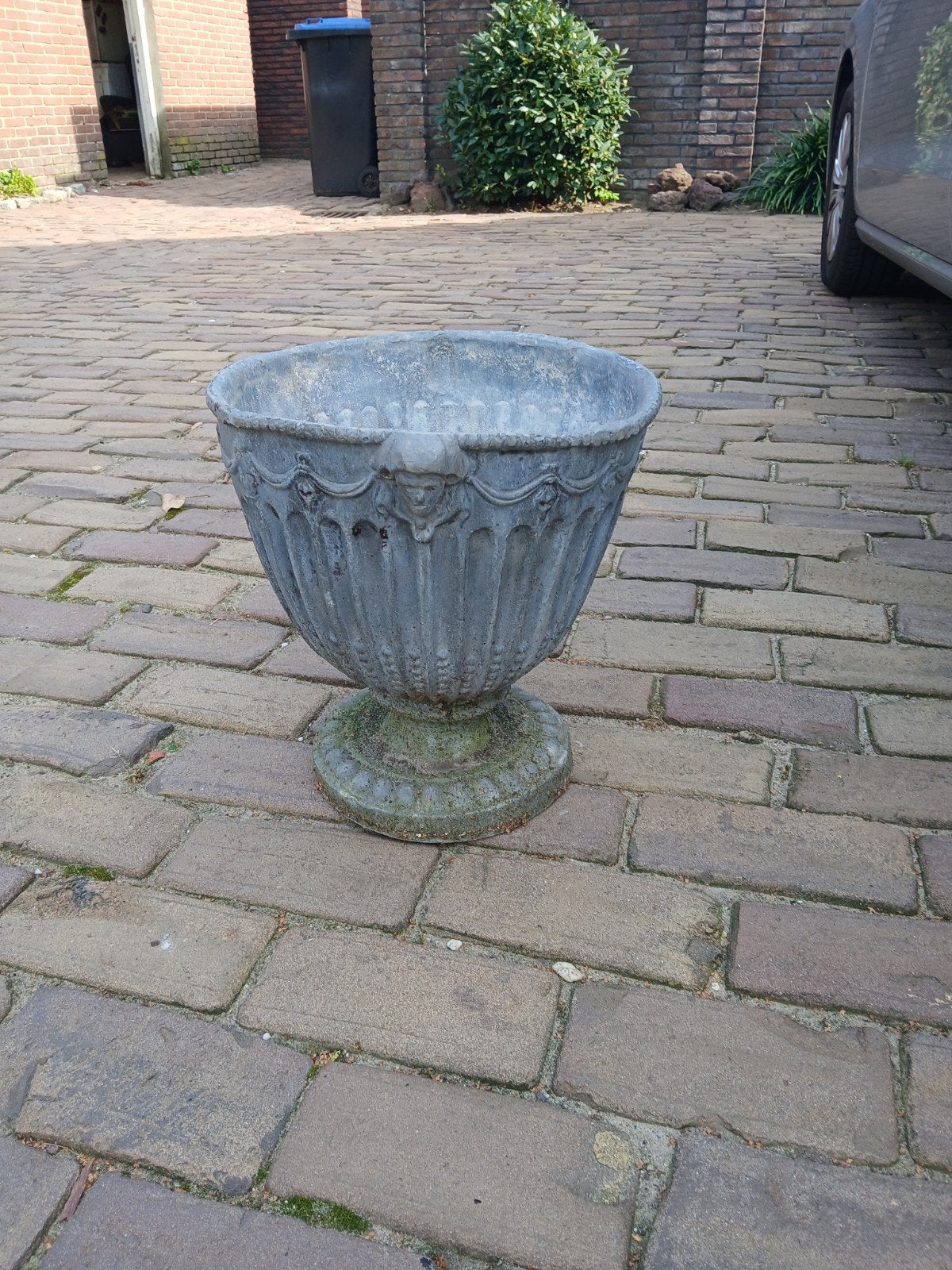 loden bloempot, Ophalen