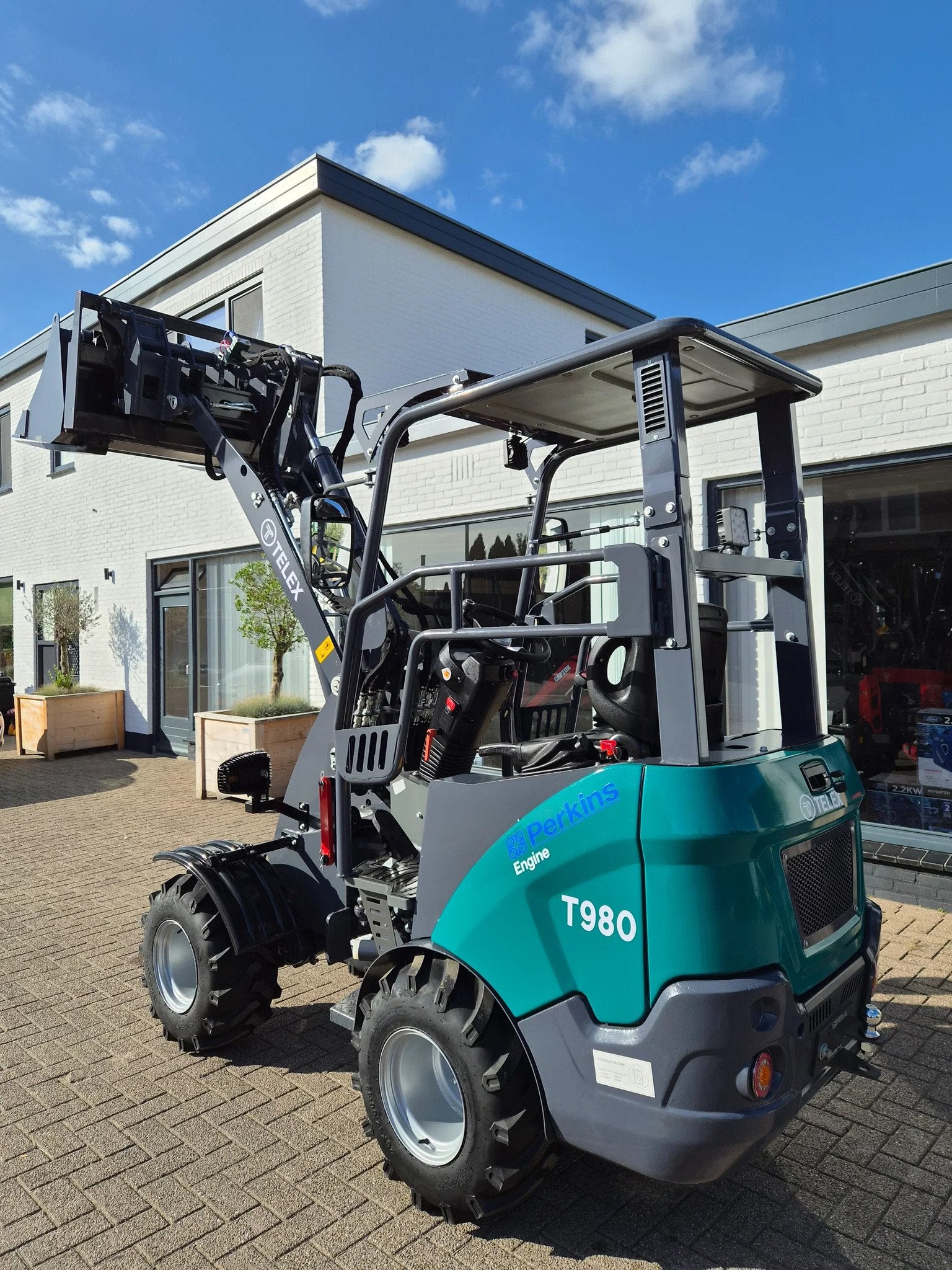 Perkins Telex loader bak en lepels shovel (bj 2026), Wiellader of Shovel