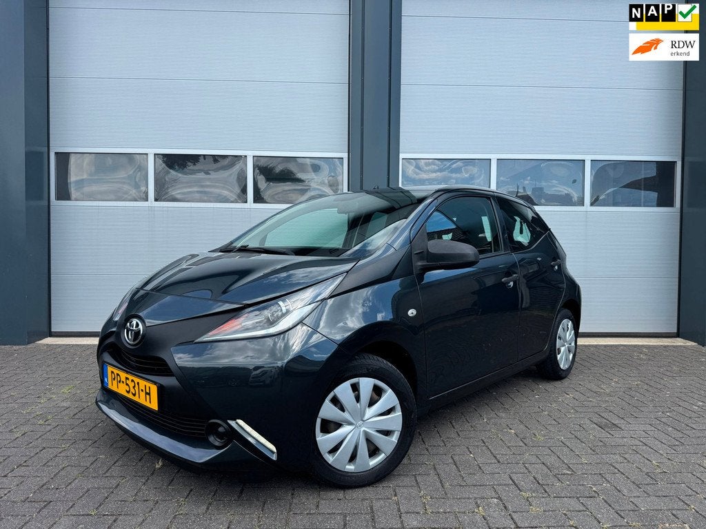 Toyota Aygo 1.0 VVT-i x-fun 5-Deurs Grijs Airco Bluetooth, Auto's, Voorwielaandrijving, Gebruikt, Euro 6, 4 stoelen