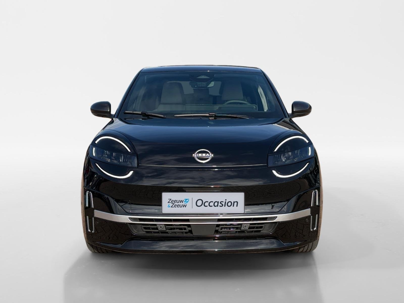 Nissan Micra EVOLVE 52 kWh *Navi+Camera*Winter Pack*Harman K, Stof, 150 pk, Zwart, Origineel Nederlands