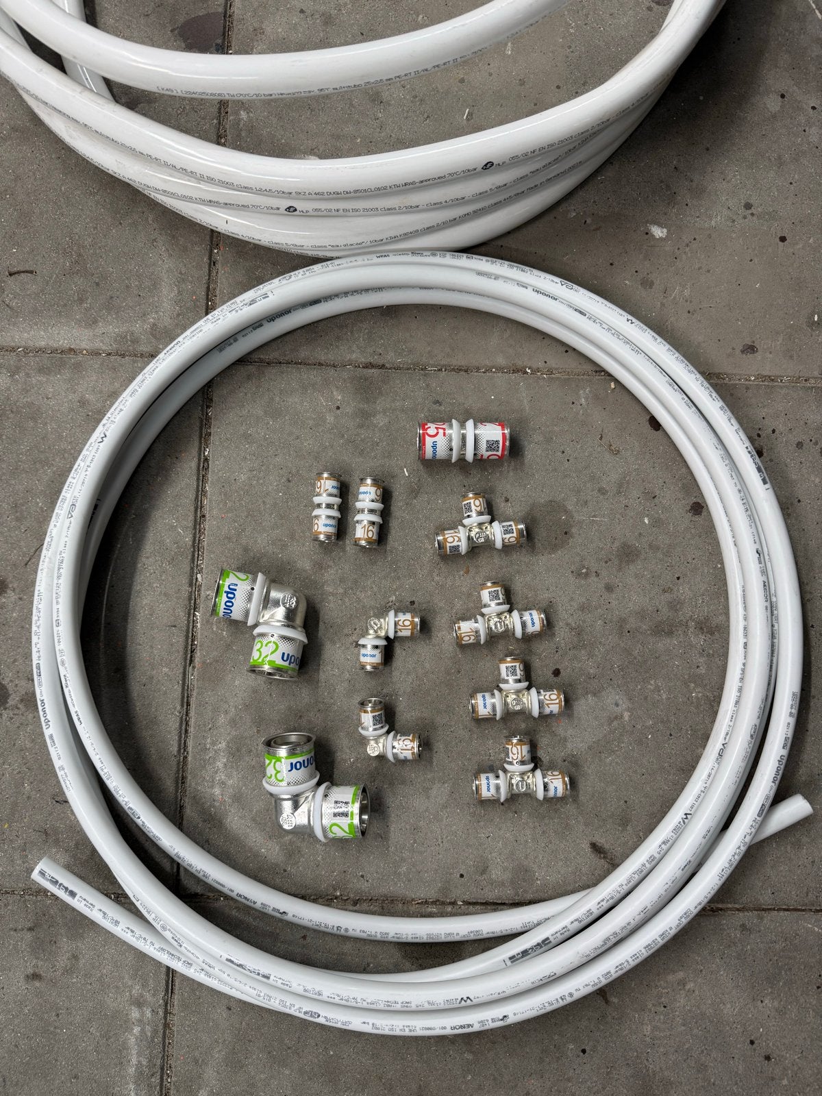 Diverse Uponor koppelingen en slang 16x2mm en 25x2,5mm, Ophalen of Verzenden, Nieuw