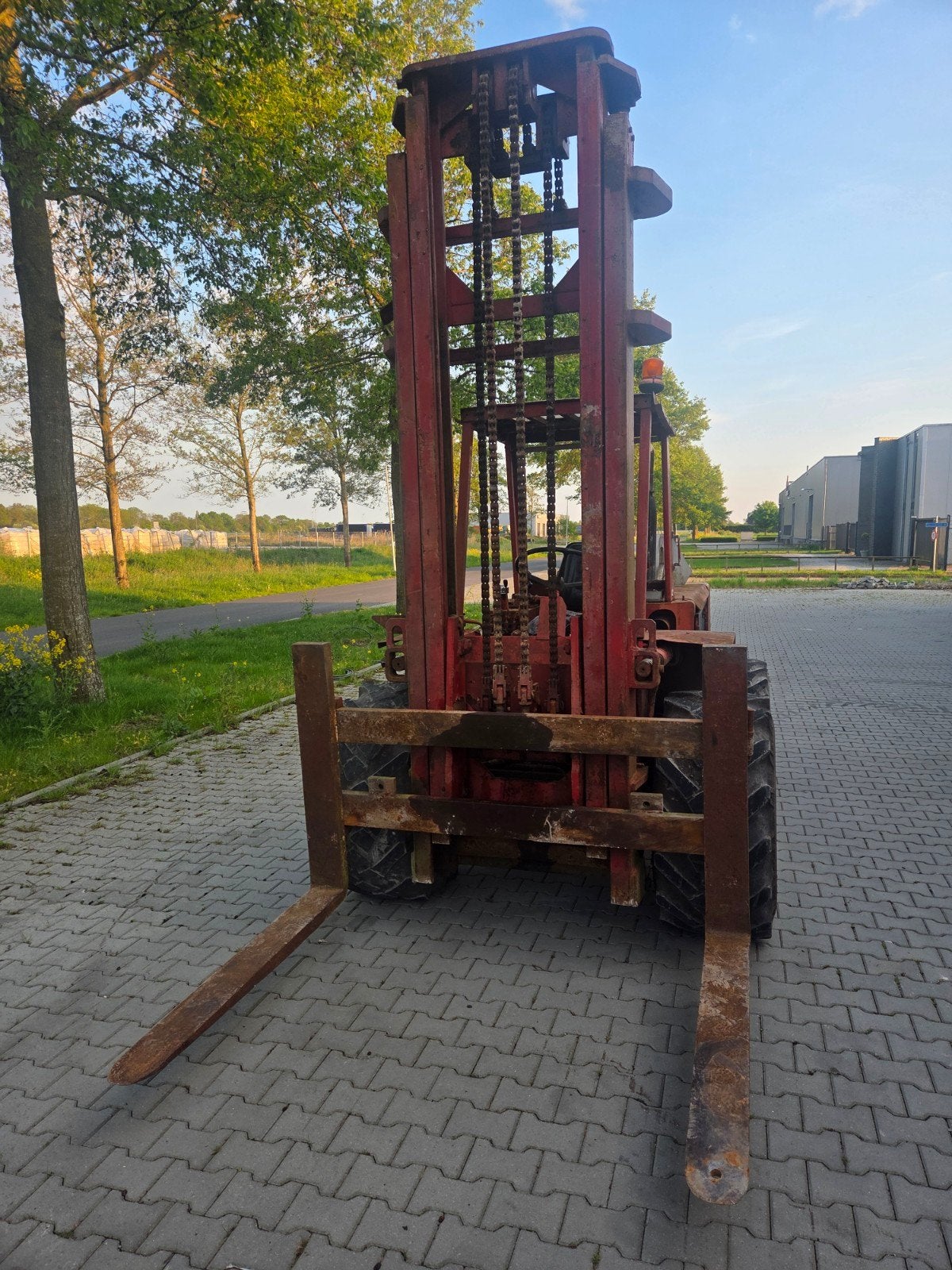 Manitou Ruw terrein heftruck opknapper, Ophalen
