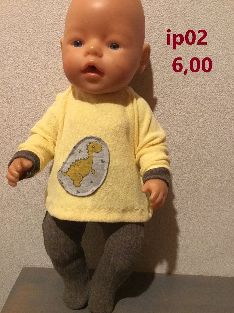 Poppenkleertjes baby born. Set dino. Opbrengst KiKa., Ophalen of Verzenden, Nieuw, Babypop