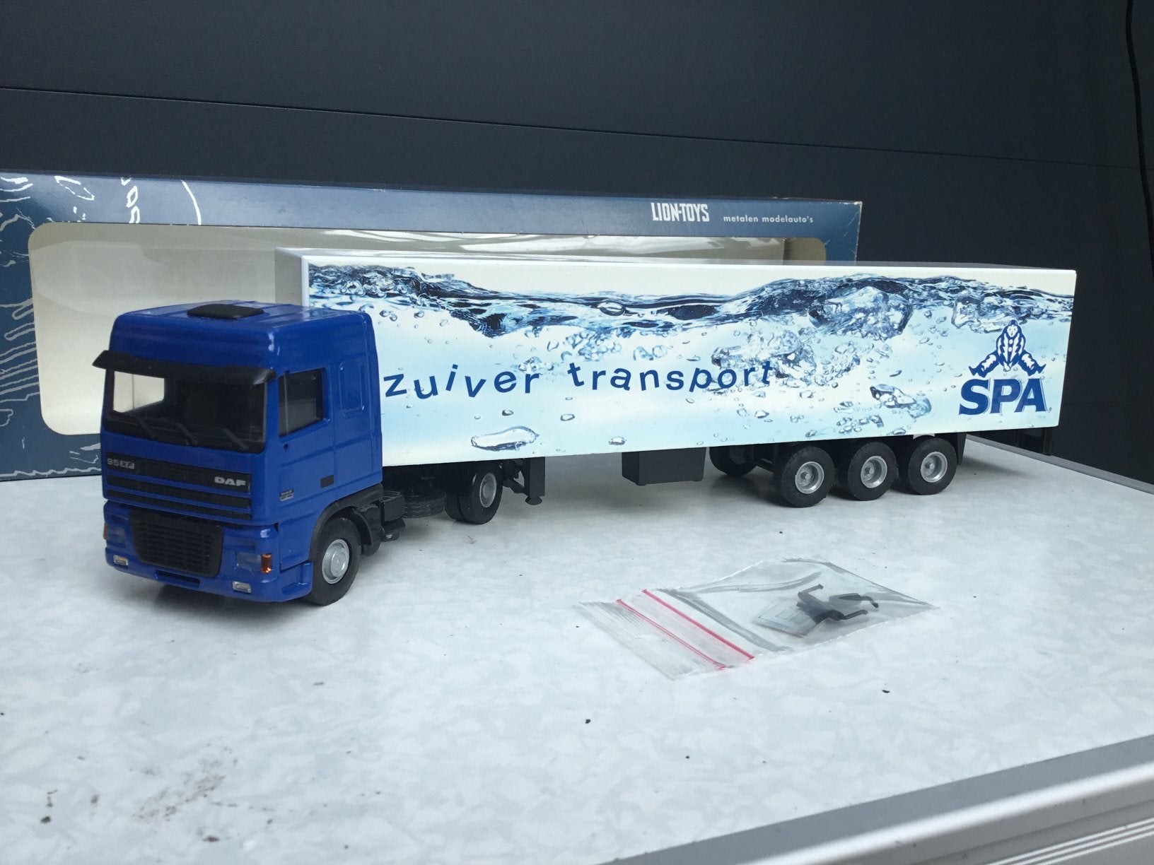 Lion Car Daf XF Spa in ovp en Spiegelset, Ophalen of Verzenden, Zo goed als nieuw, Bus of Vrachtwagen, Lion Toys