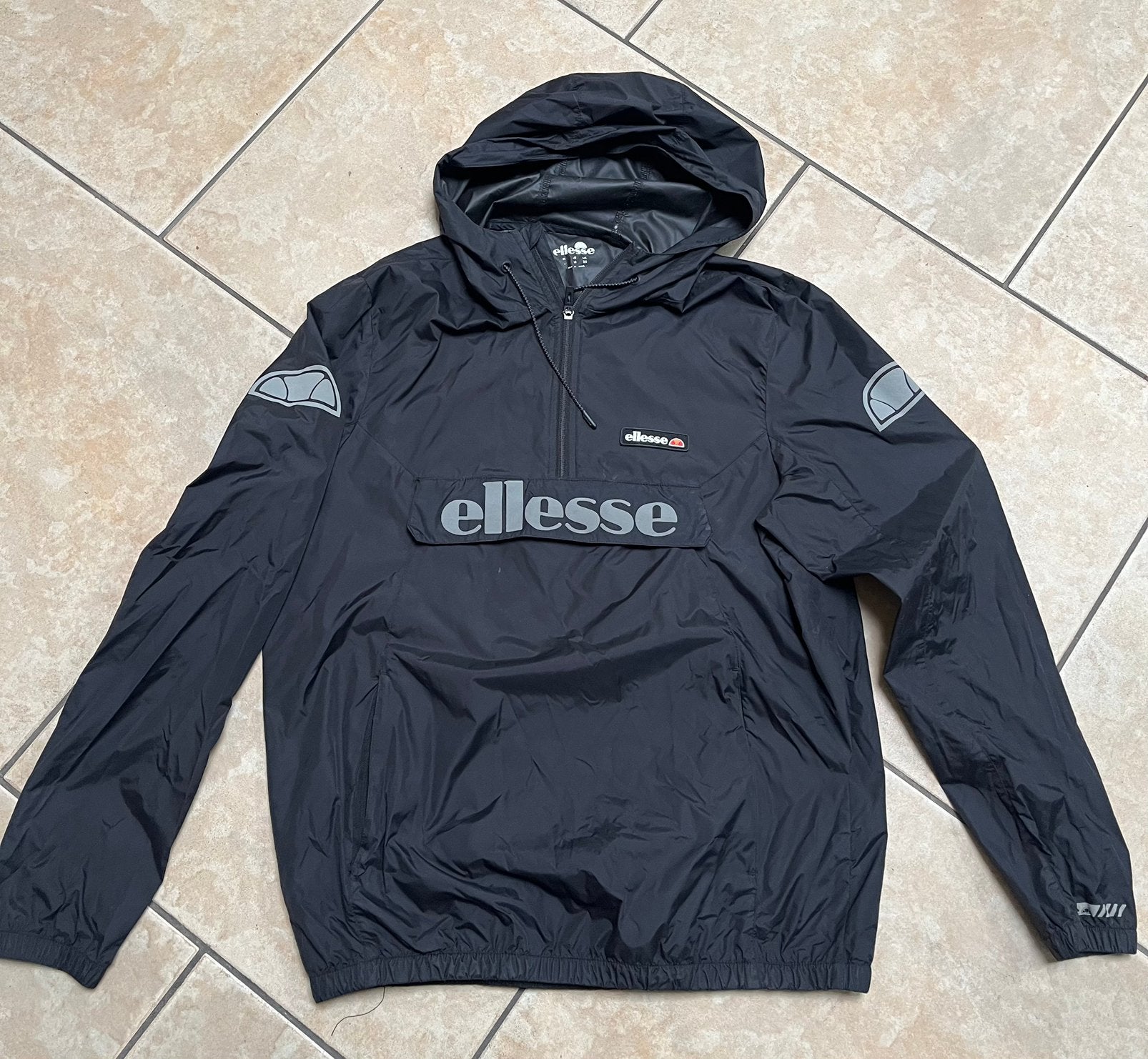 Ellesse jas, Ophalen of Verzenden, Zo goed als nieuw, Jongen of Meisje, Jas