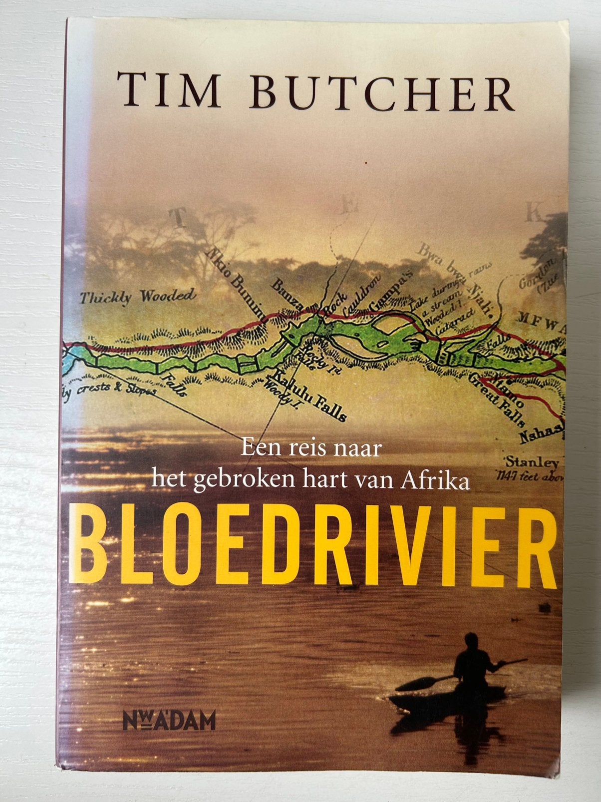 T. Butcher - Bloedrivier, Gelezen, Afrika, Ophalen of Verzenden, T. Butcher