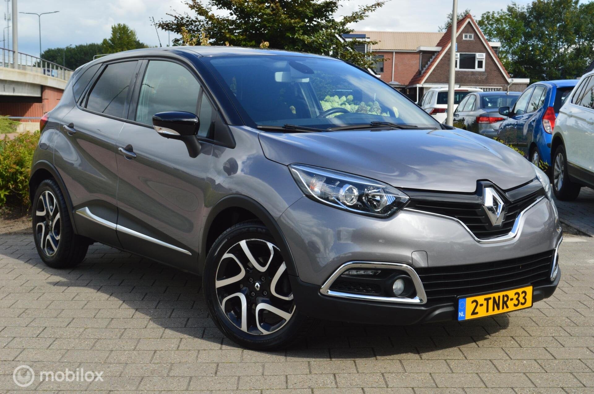 Renault Captur 1.2 TCe AUTOMAAT Dynamique | 43.000km !, Auto's, Euro 5, Stof, Zwart, 4 cilinders