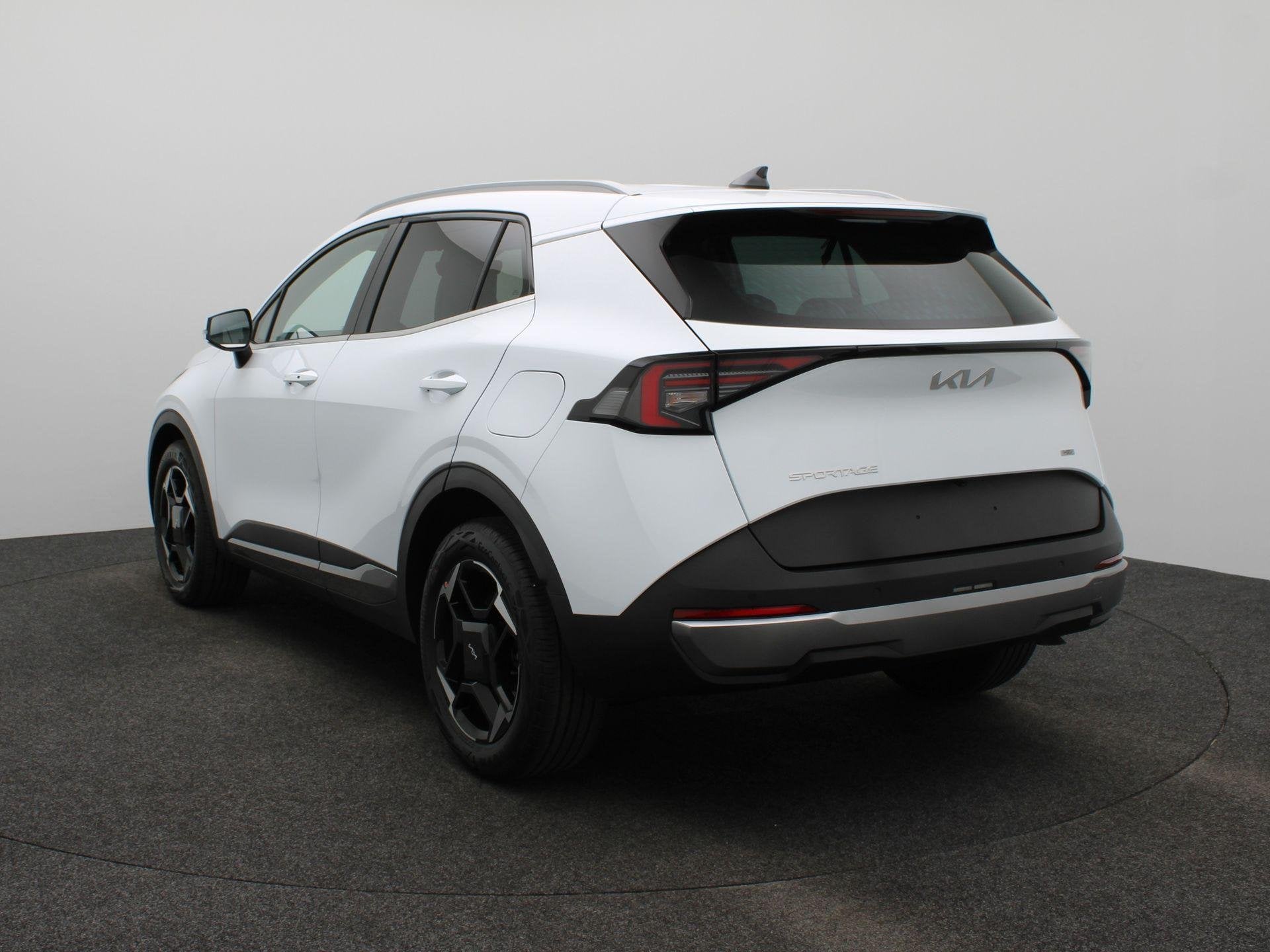 Kia Sportage 1.6 T-GDi Hybrid DynamicLine | NIEUW VOORRAAD |, Euro 6, 4 cilinders, Leder en Stof, Wit