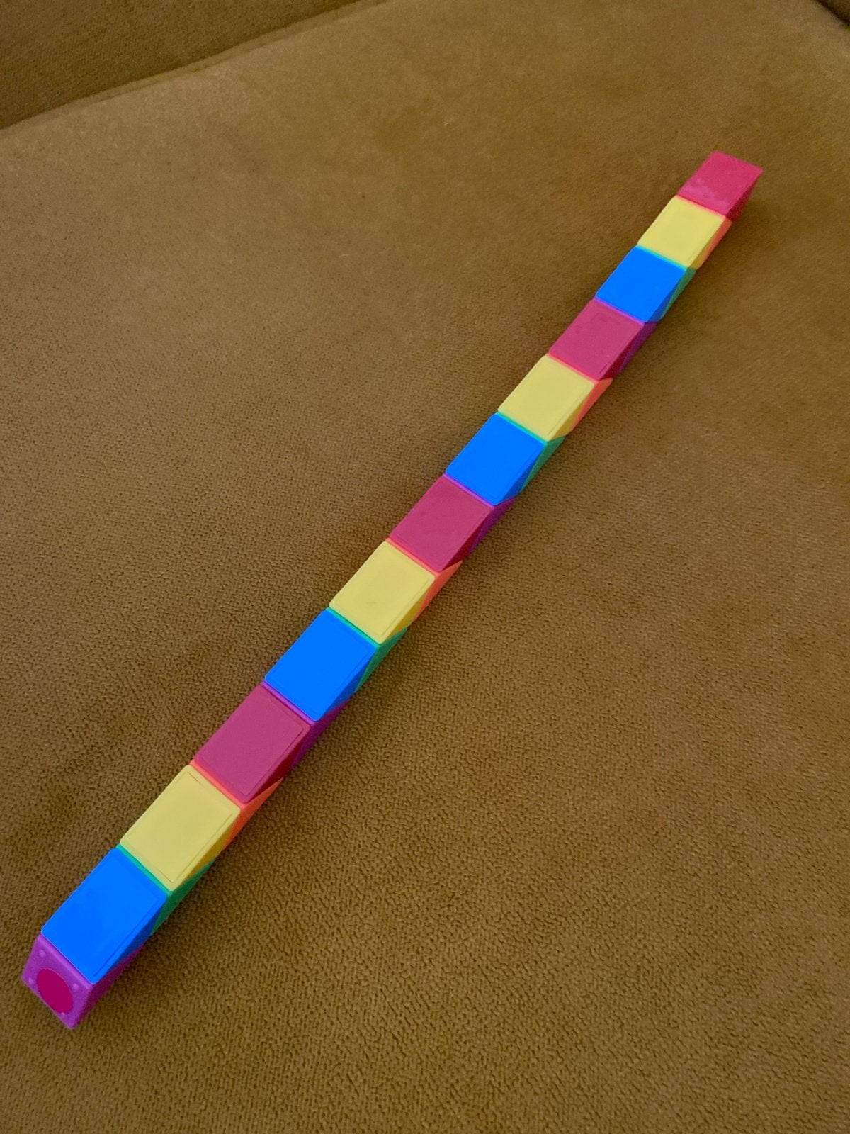 Rubik's Snake Puzzel - Kleurrijk en Flexibel, Ophalen of Verzenden, Zo goed als nieuw, Jongen of Meisje