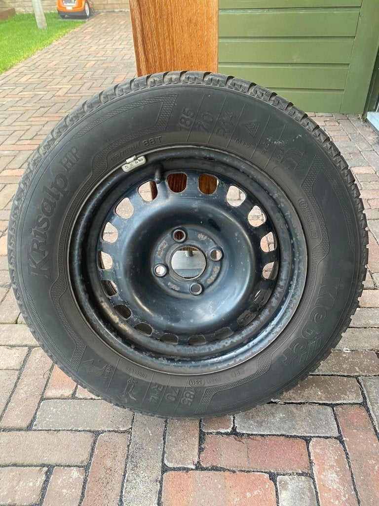 4 Winterbanden op stalen velgen 185/70 R14, Ophalen
