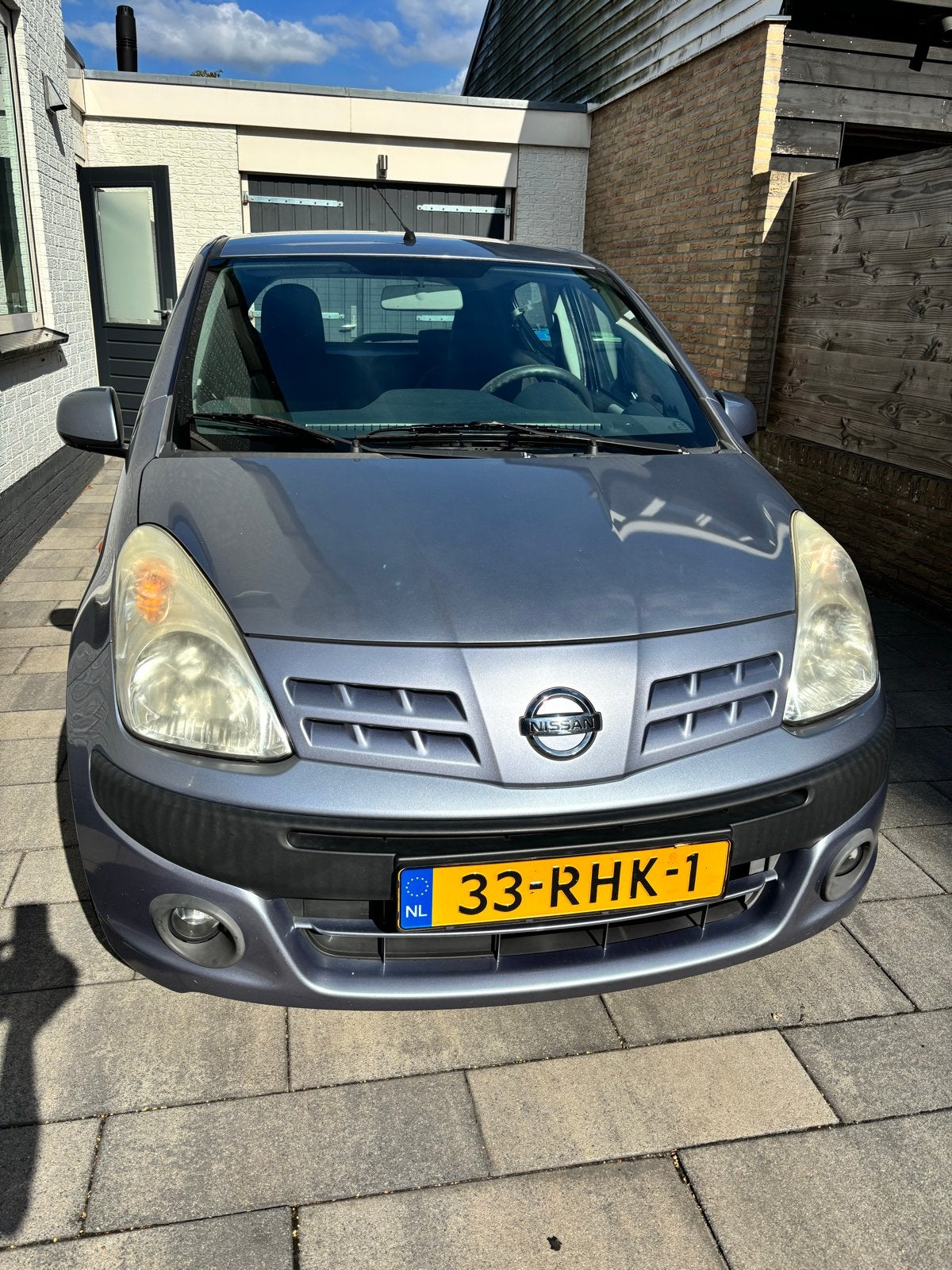 Nissan Pixo 1.0 50KW 5D 2011 Grijs, Auto's, Nissan, Voorwielaandrijving, 200 kg, 4 stoelen, Origineel Nederlands