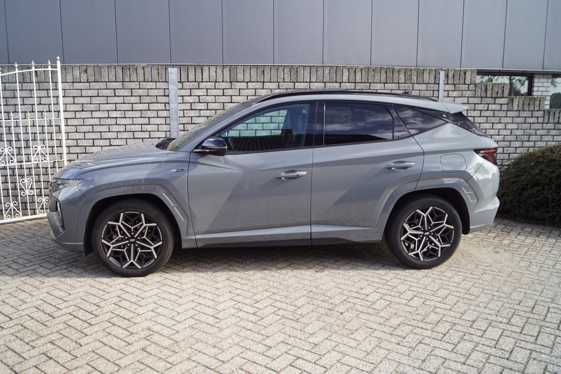 Hyundai Tucson 1.6 T-GDI Hybrid N-Line Autom Panodak Leder/A, Auto's, Dealer onderhouden, Gebruikt, 4 cilinders, 1650 kg