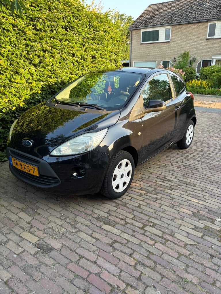 Ford Ka 1.2 trend, 2009 Zwart, 88000km, 1e eigenaar, Auto's, Ford, Voorwielaandrijving, 1242 cc, 4 cilinders, 4 stoelen