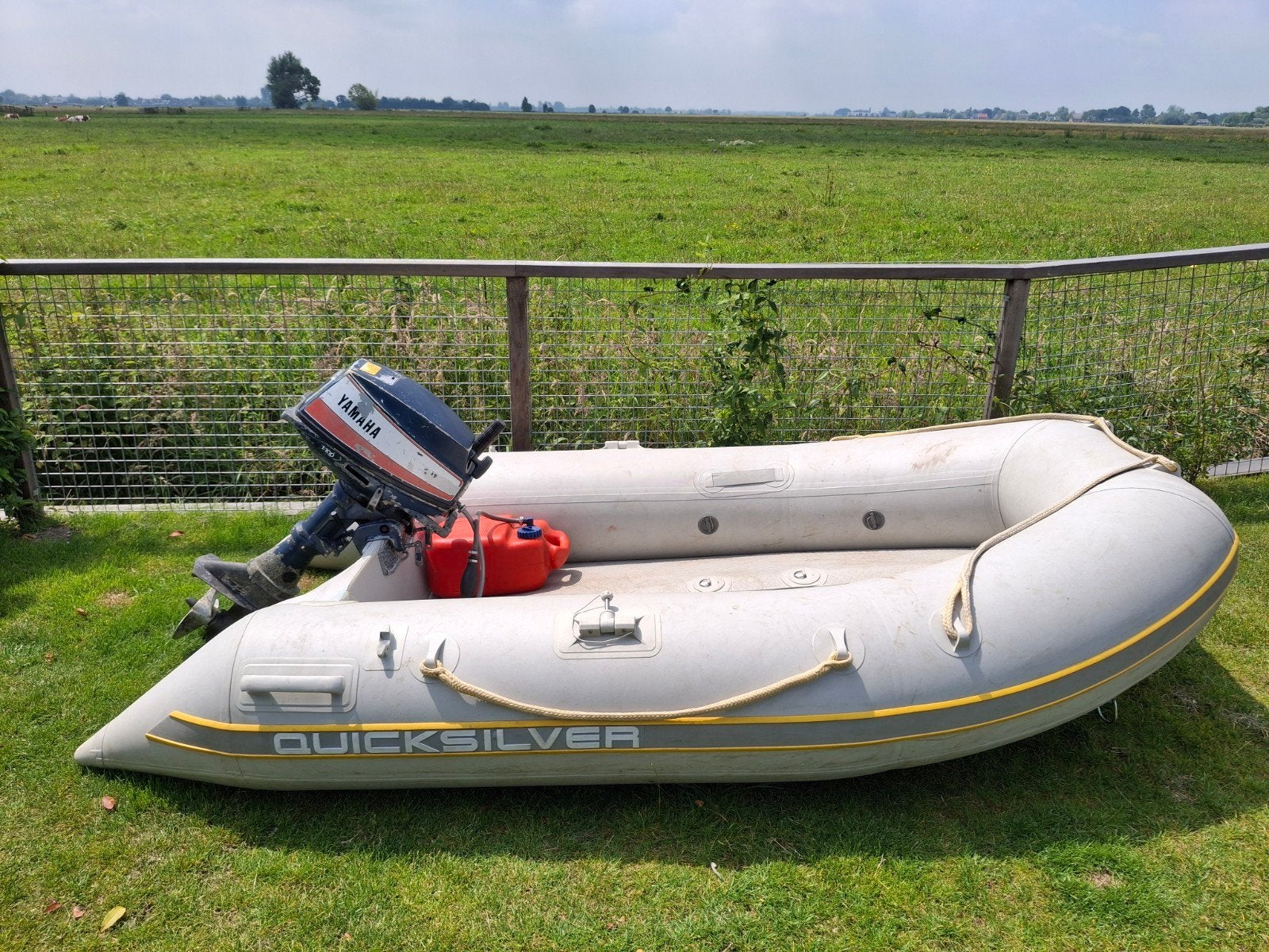 Rubberboot met 6pk buitenboordmotor, Ophalen