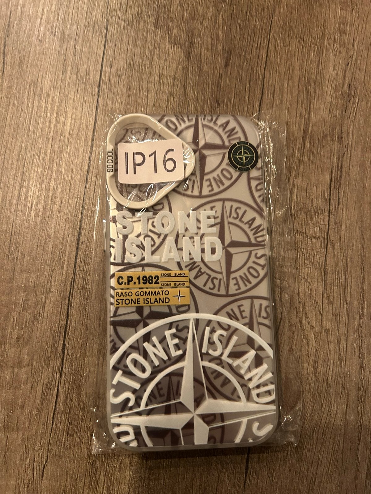 Stone Island iPhone 16 Hoesje - Nieuw in verpakking, Telecommunicatie, Kunststof, IPhone 16, Nieuw, Hoesje of Tasje