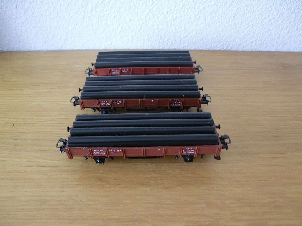 Drie Marklin wagens 4423 elk beladen met zwarte buizen, Wisselstroom, Wagon, Ophalen of Verzenden, Zo goed als nieuw