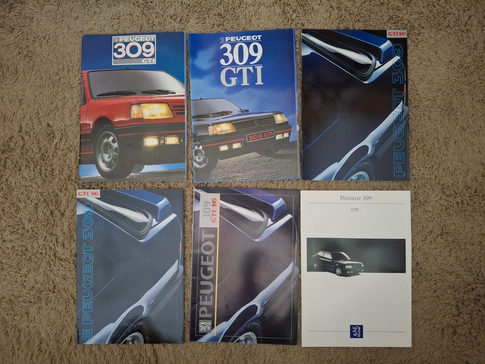 lot autofolders Peugeot 309 GTI, Verzenden, Zo goed als nieuw, Peugeot