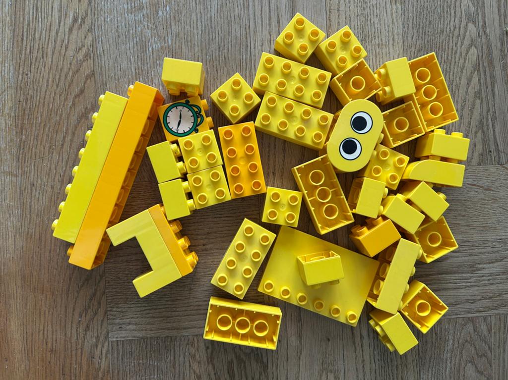 Grote partij gele LEGO DUPLO blokken met klok en oogjes, Ophalen of Verzenden, Zo goed als nieuw, Losse stenen, Duplo