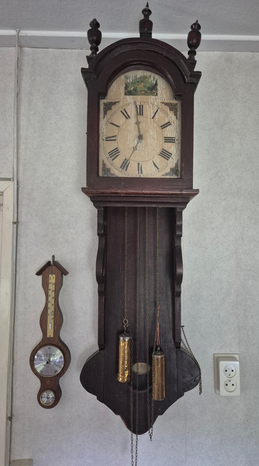 Antieke klok met barometer, Ophalen
