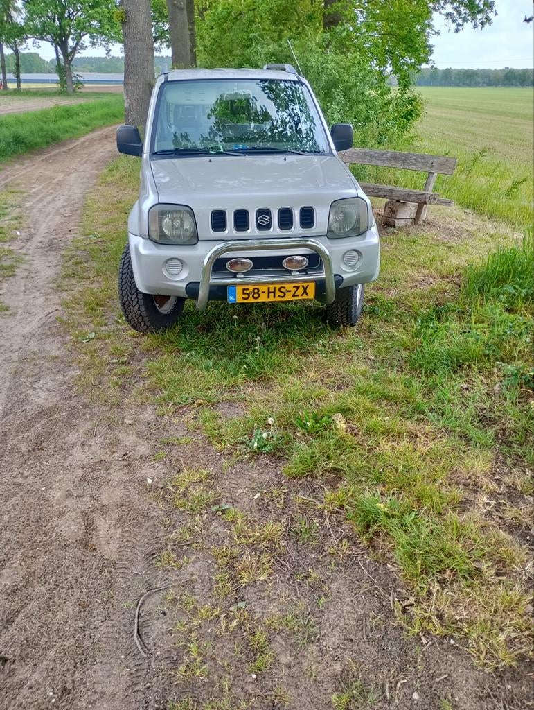Suzuki Jimny 1.3 JX 4WD 2002 Grijs, 13 km/l, 40 €/maand, 4 cilinders, 4 stoelen