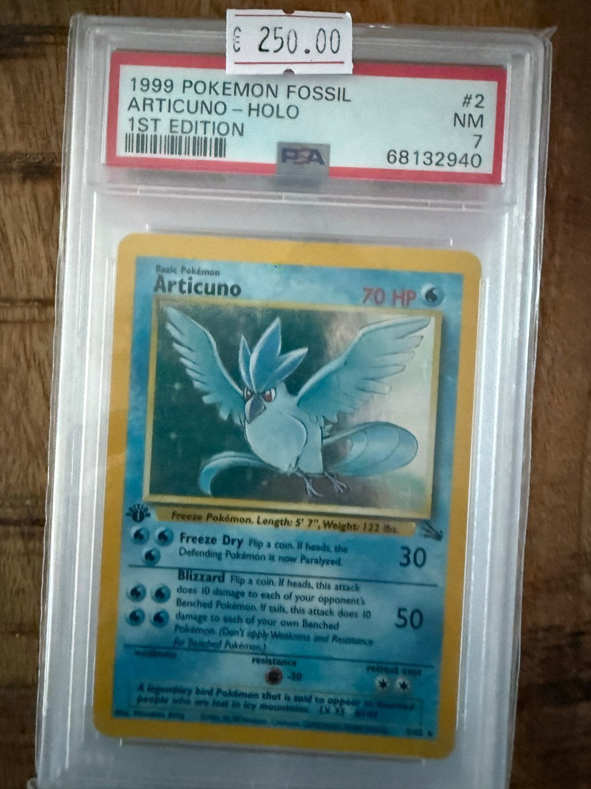 1999 Pokémon Fossil Articuno Holo 1st Edition PSA 7, Ophalen of Verzenden, Zo goed als nieuw, Losse kaart, Foil