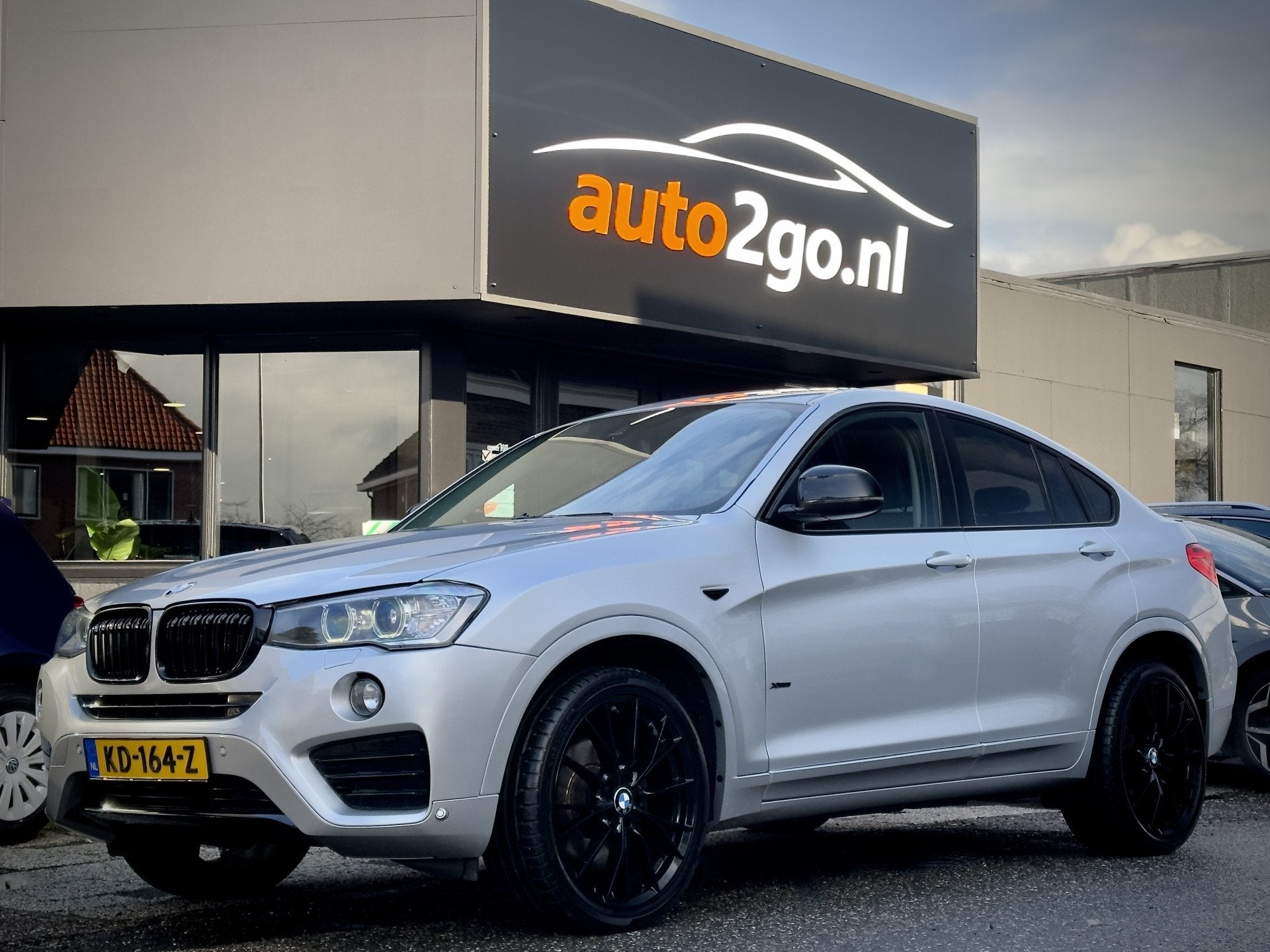 BMW X4 xDrive20i 184PK AUT8 EXECUTIVE M-SPORT LEDER NAVI AIR, Gebruikt, 2000 kg, Leder en Stof, X4
