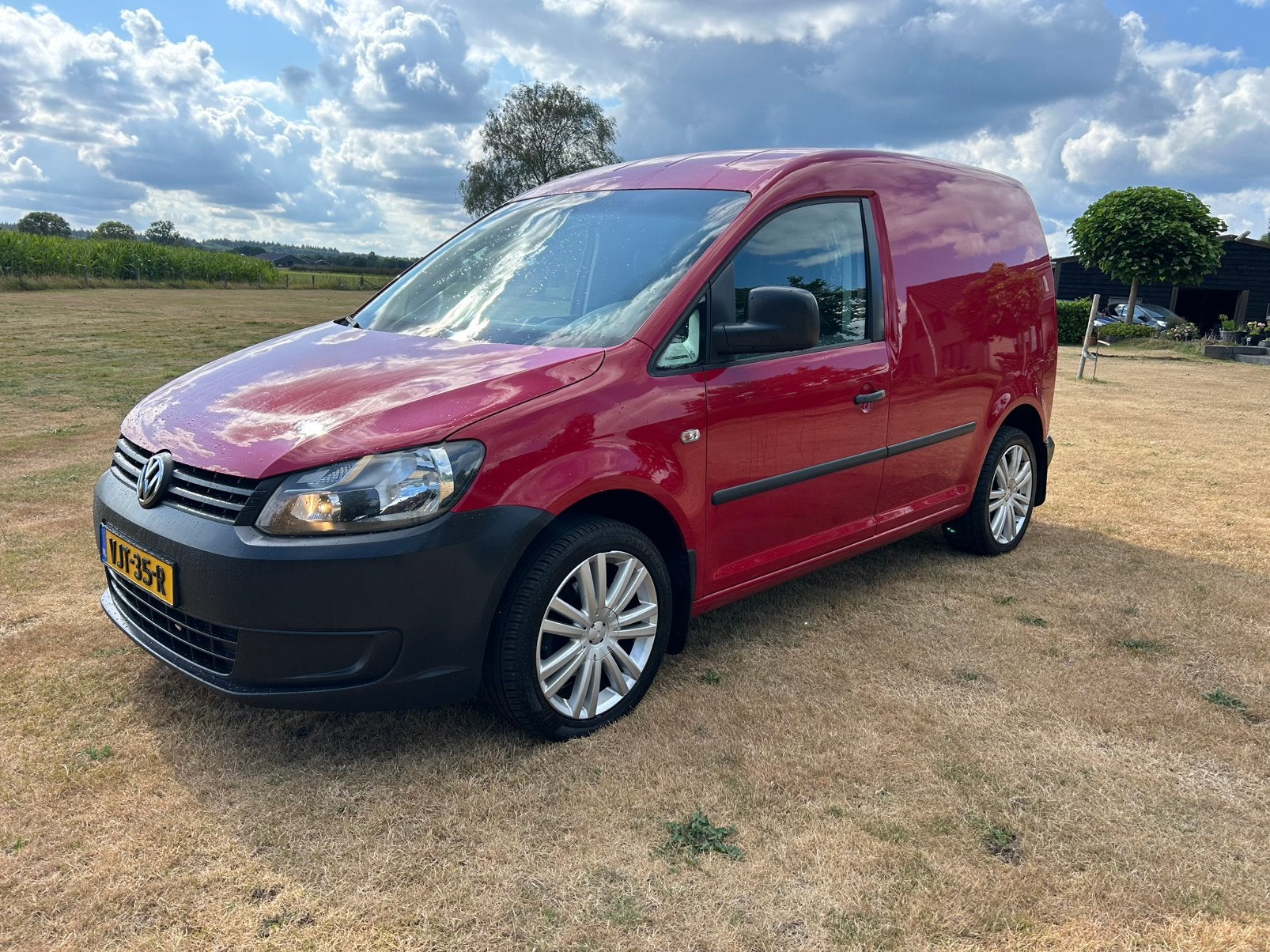 Volkswagen Caddy 2.0 Benzine/ CNG 80KW 2011 Rood, Auto's, Voorwielaandrijving, Euro 5, Stof, 4 cilinders