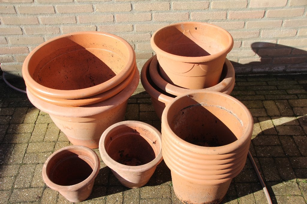 bloempotten kunststof terra cotta kleur, Tuin en Terras, Bloempotten, Ophalen, Kunststof, Rond, Zo goed als nieuw