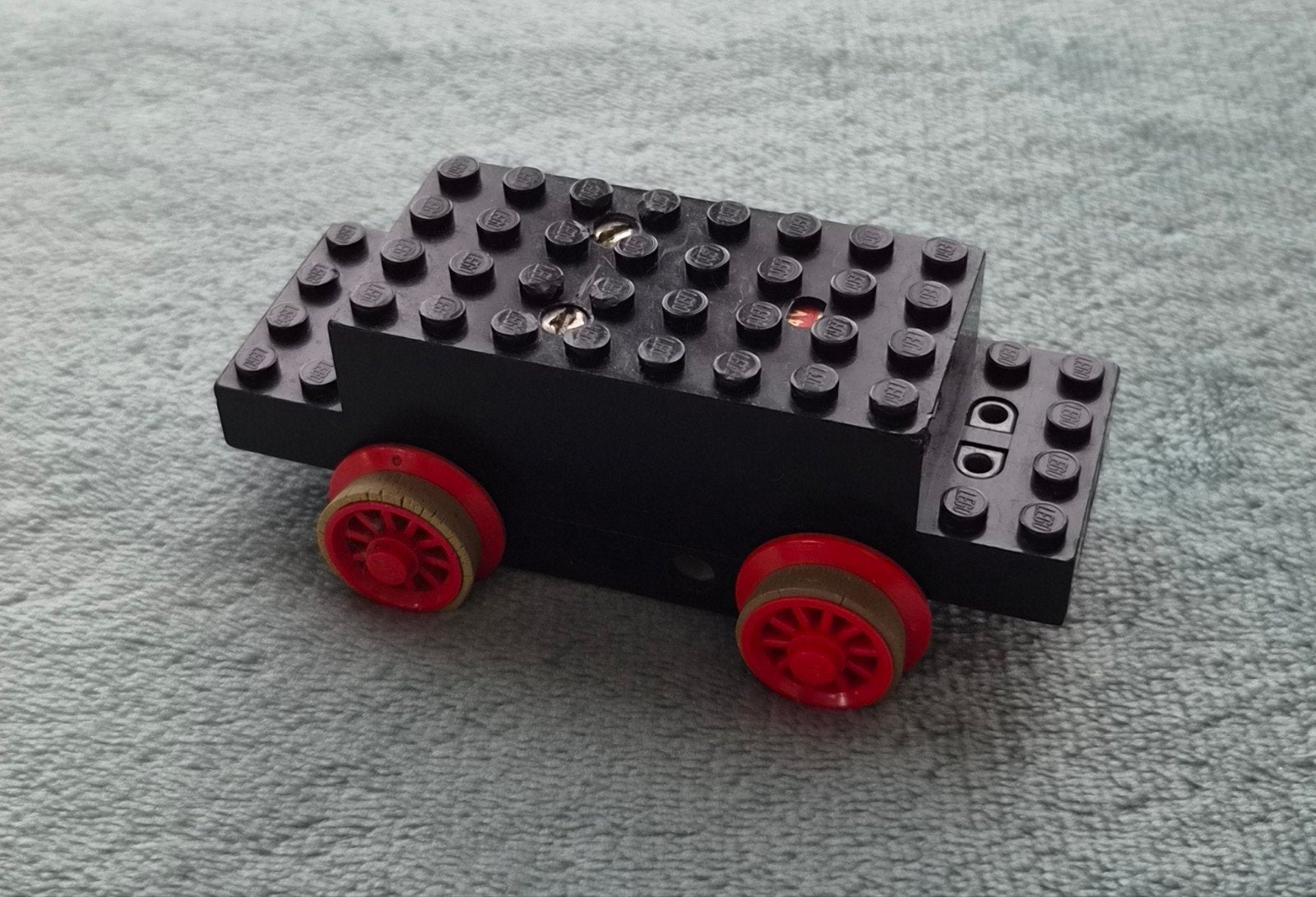 Lego trein 4,5 Volt blauwe rail locomotief motor  + wielen., Ophalen of Verzenden, Gebruikt, Losse stenen, Lego