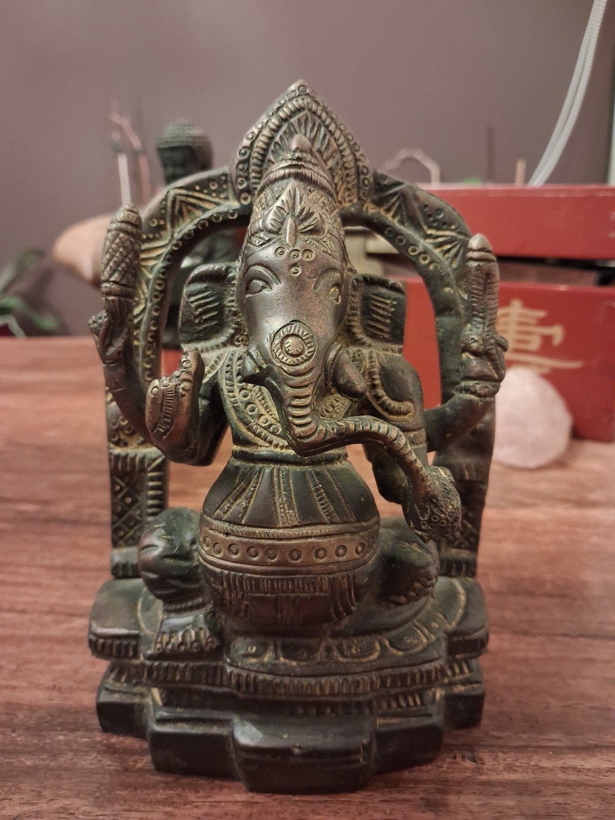 Bronzen Ganesha en Slangenvrouw Beelden, Ophalen