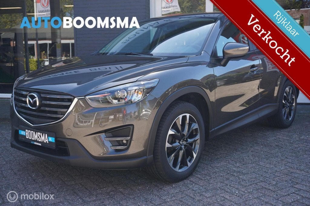 Mazda CX-5 2.0 SkyActiv-G 165pk Nakama Clima Navi Trekhaak, Voorwielaandrijving, 1998 cc, Stof, Zwart