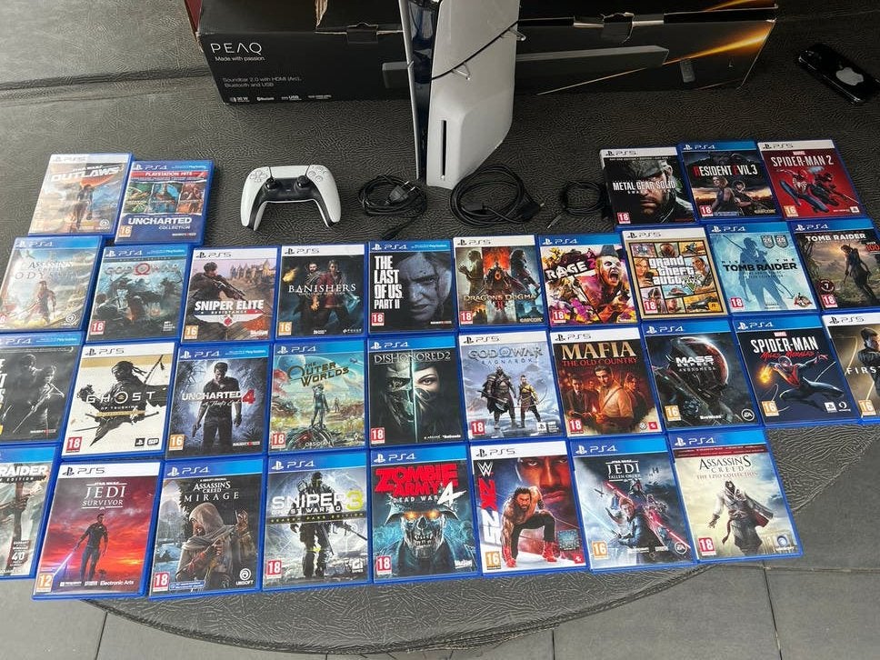 PS5 Disc Edition met 1 controllers en 33 games, Vanaf 18 jaar, Overige genres, 2 spelers, Eén computer