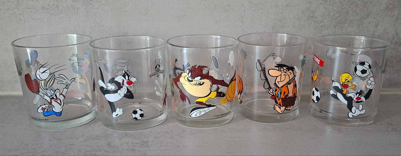Set van 5 Looney Tunes drinkglazen duo penoti t.e.a.b, Huis en Inrichting, Glas of Glazen, Gebruikt, Ophalen of Verzenden, Glas