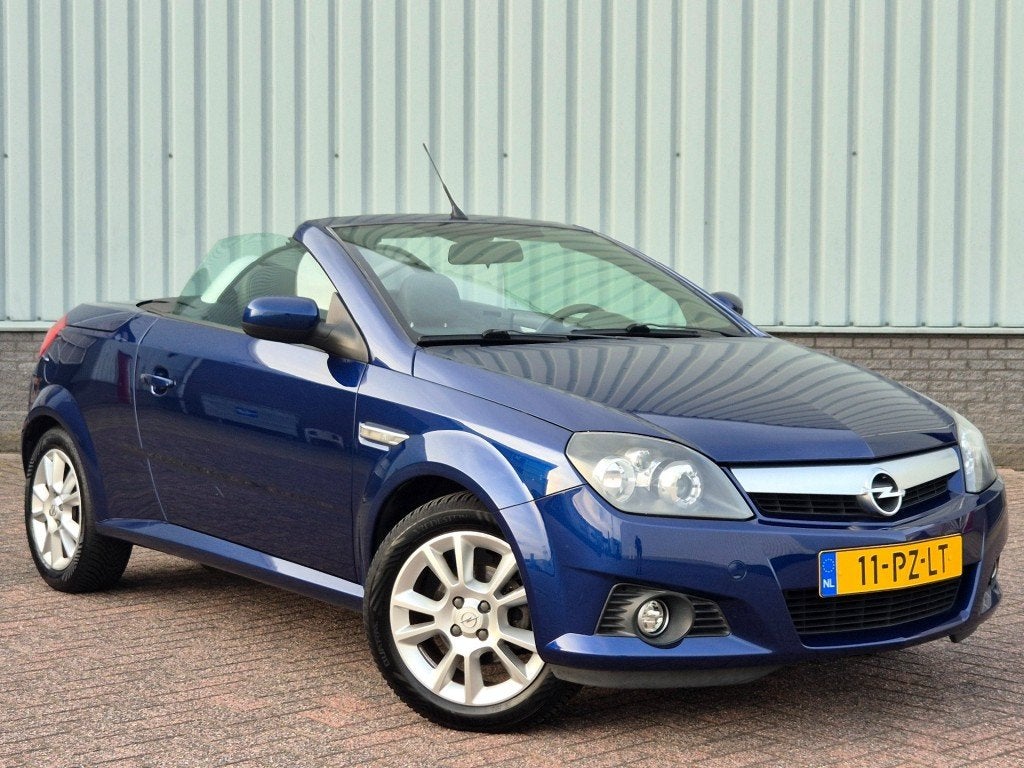 Opel TIGRA 1.4 16v Cabrio Airco 89.000 km Nederlandse Auto, Voorwielaandrijving, Gebruikt, 4 cilinders, Cabriolet