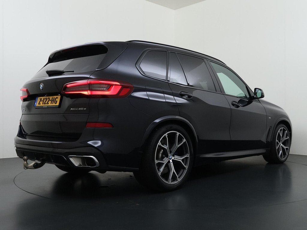 BMW X5 xDrive45e High Executive M Pakket Trekhaak Laser HUD, Auto's, BMW, Gebruikt, 394 pk, Zwart, Vierwielaandrijving