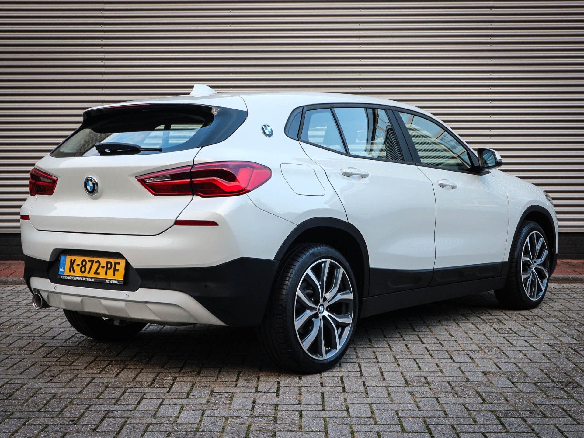 BMW X2 sDrive18i High Executive Clima | Cruise | Navi | Led, Auto's, Gebruikt, Euro 6, Wit, Grijs